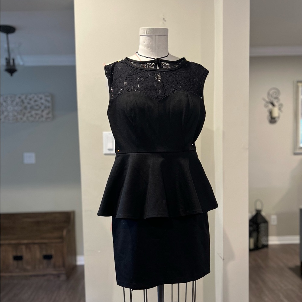 Peplum mini dress with lace detail